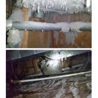 This is the same space from the previous image, displaying a crawl space filled and coated with lint. (2/3)